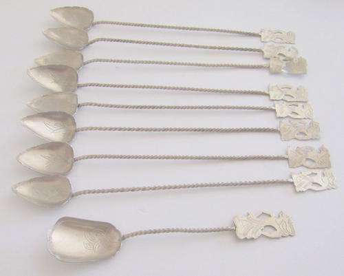 9 X EASTERN SPOONS