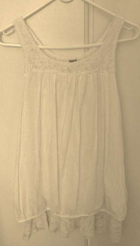 Longer length dress top 100 % cotton fits a size 34 and 36