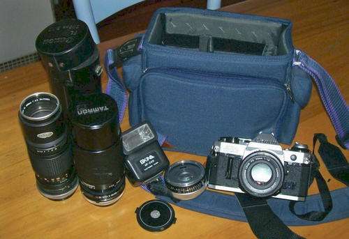 CANON AE-1 PROGRAM film camera, accessories & large bag.