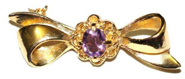 ELEGANT BOW BROOCH WITH AMETHYST COLOUR RHINESTONE
