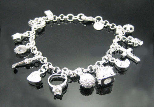 GORGEOUS SILVER BRACELET WITH 13 SILVER CHARMS!!