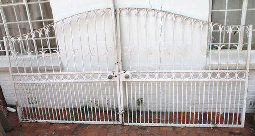 Metal Driveway Gate And Small Pedestrian Gate