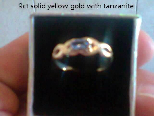 9ct Solid yellow gold with tanzanite sett