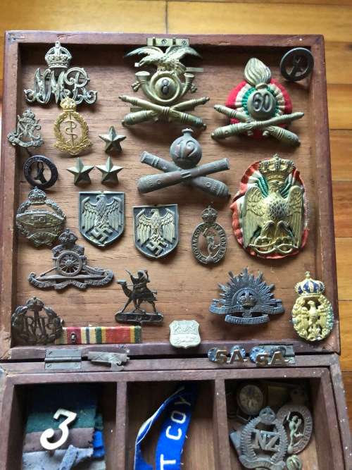 WWII  badges, pins, buttons