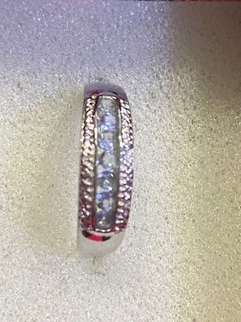 Sterling silver hallmarked Genuine Tanzanite and Diamond ring: US size 7: