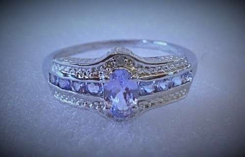Sterling silver hallmarked Genuine Tanzanite and Diamond ring: US size 7