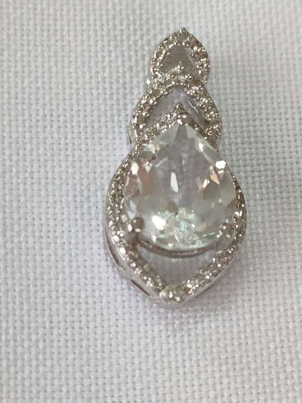 Topaz and diamond sterling silver pendant - 925 stamped