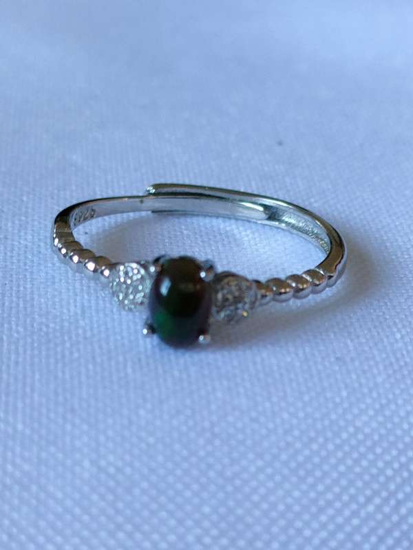 Sterling Silver BlacK Ethiopian Opal and White Topaz ring: Stunning piece: Size: US7Weight: 0.80.ct+