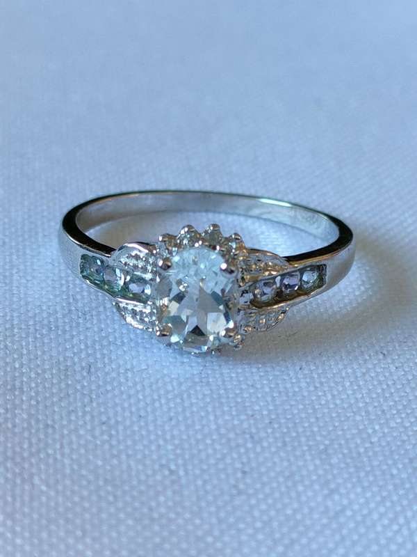 Sterling Silver White Topaz, Tanzanite and diamond ring: Size: US 7 Weight: 1.20.ct+