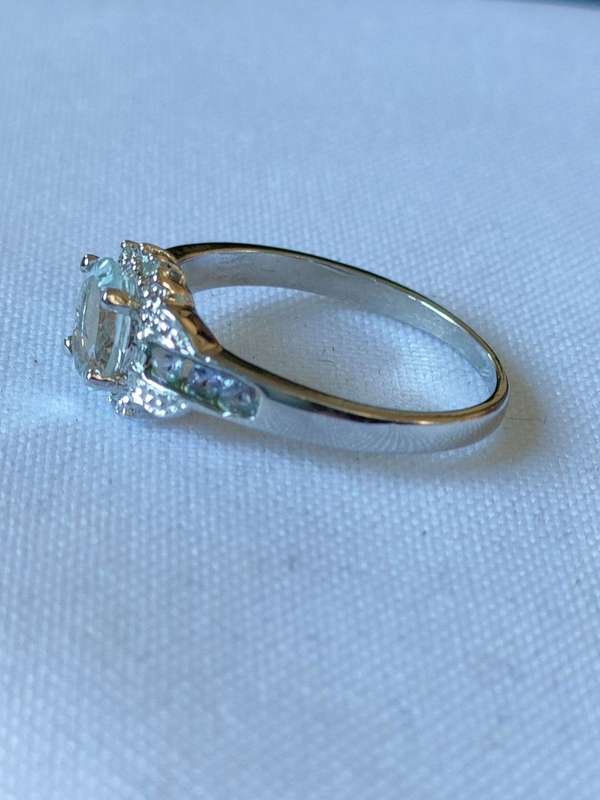 Sterling Silver White Topaz, Tanzanite and diamond ring: Size: US 7 Weight: 1.20.ct+