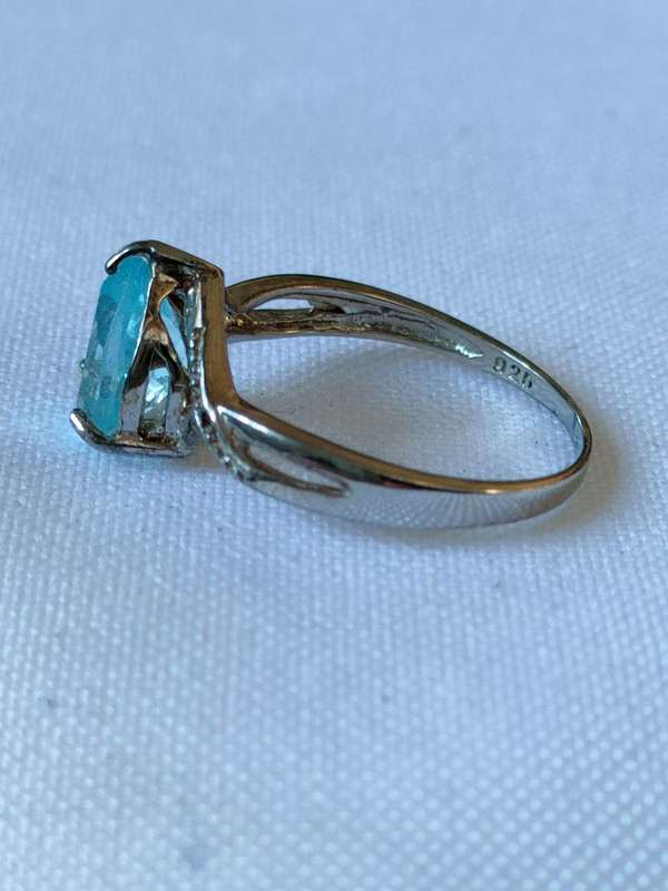 Sterling Silver Blue Topaz and diamond ring: Size: US 7 Weight: 1.50.ct+