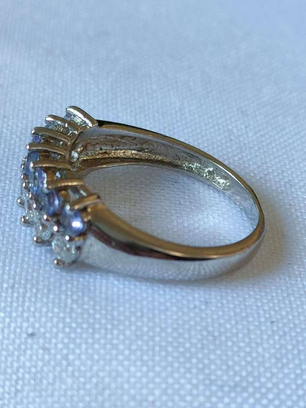Sterling Silver Tanzanite, White Topaz and diamond ring: Size: US 7 Weight: 1.00.ct+