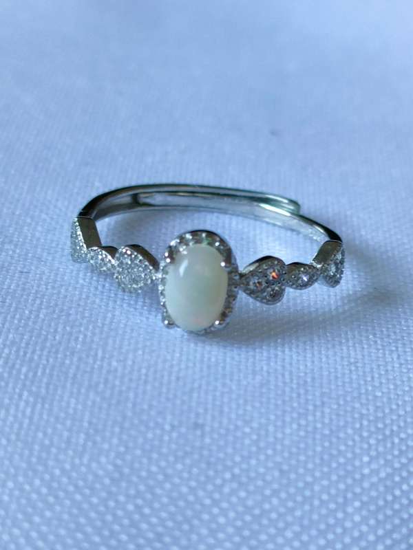 Ethiopian Opal and Topaz sterling silver ring - adjustable size - naturally mined stones- 0.90 ct