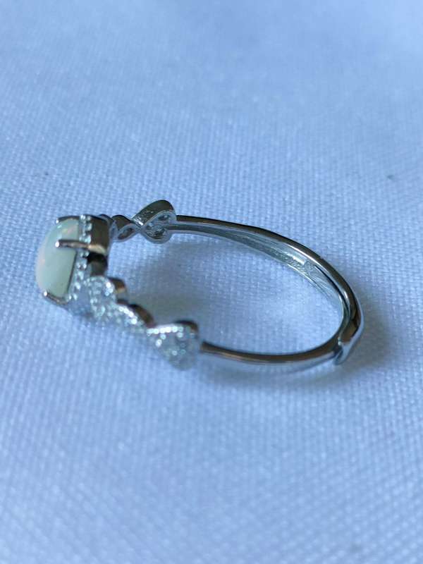 Ethiopian Opal and Topaz sterling silver ring - adjustable size - naturally mined stones- 0.90 ct