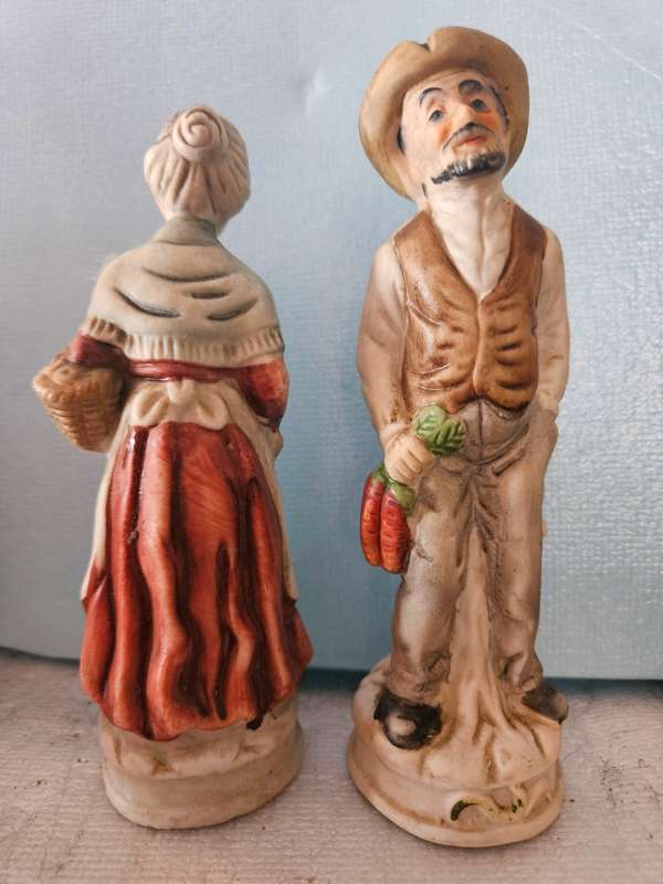 Vintage Figurines Rayware Farmer and Wife - This is a pair of vintage ceramic or porcelain Figurines