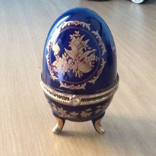 Ceramic blue and gold egg shaped trinket box