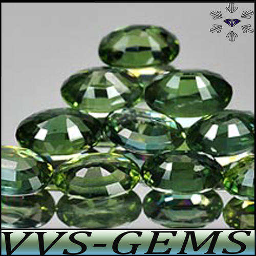 SAPPHIRE - BLUE OR GREEN AND GEM GREENISH BLUE OR FOREST BLUE GREEN GEMSTONES.