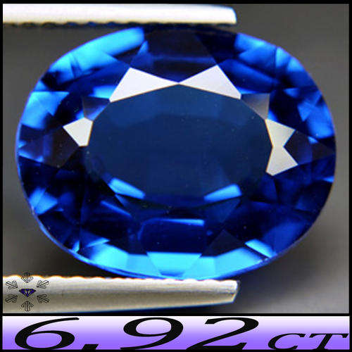 6.92CT LUSTREOUS LONDON BLUE TOPAZ  [VVS] - PRECISION POLISHED OVAL GEMSTONE (IRRADATED)