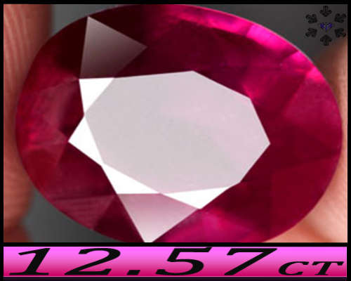 12.57ct Lustrous Fancy Cabo Delgado Ruby Oval - SI - Medium Deep Purplish Red (Lead Glass Treated)