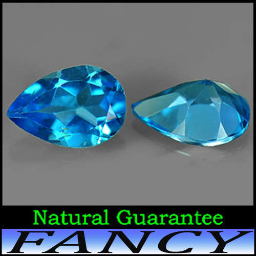 4.04ct Intense Swiss Blue Topaz Pair - VVS -  Two Modern Multi-Facect Pear Gems