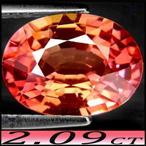 2.09ct Vivid Padparadscha Oval Sapphire - VVS - Lab Created (Synthetic Corundum)