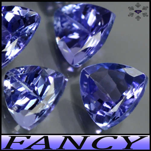0.53ct Violetish Blue Natural Tanzanite - VS - Two Matching Fancy Trilliants (Heated)