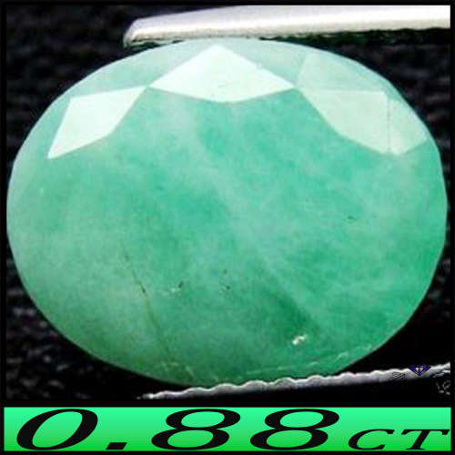 0.88ct Natural Medium Light Green Emerald - Zambian Opaque Oval (Cedar Oiled)