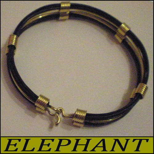 ELEPHANT TAIL STRANDS BOUND TOGETHER IN A TRADIONAL AFRICAN STYLED BRACELET.