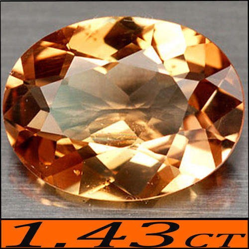 1.43 CT IMPRESSIVE CHAMPAGNE IMPERIAL TOPAZ, A NATURAL UNHEATED OVAL POLISHED GEMSTONE.