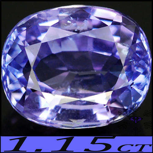 1.15 CT VIBRANT VIOLET BLUE TANZANITE, A SCINTILLATING NATURAL OVAL GEMSTONE.