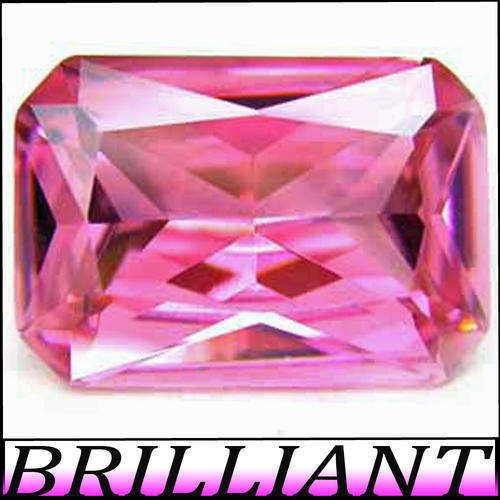 2.10 CT PERFECT LUSTROUS PINK DIAMOND SIMULATE, POLISHED IN A CALIBRATED EMERALD. (8.0 x 6.0mm)