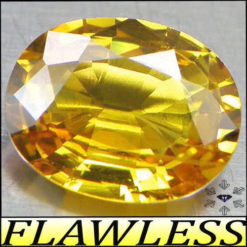 2.00 CT CALIBRATED INTENSE FANCY COLOURED YELLOW SIMULATED DIAMOND, A MACHINE POLISHED OVAL