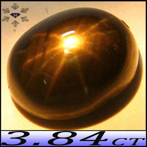 3.84 CT NATURAL UNHEATED 12-RAY STAR SAPPHIRE - A SMASHING GOLDEN BLACK CABACHON GEMSTONE.