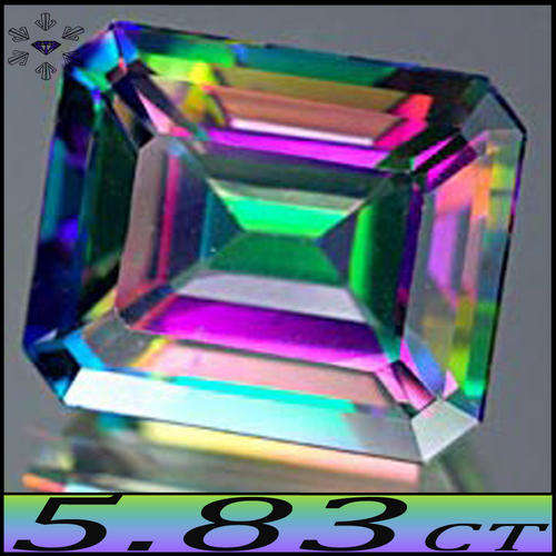 5.83CT MYSTIC TOPAZ NATURAL MAGICAL FIRE GREEN GEMSTONE POLISHED IN AN EMERALD.
