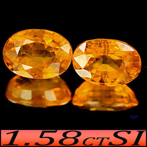PRESTINE PAIR OF SUNNY GOLDEN CLEAN FANCY ORANGE NATURAL SONGEA SAPPHIRE GEMSTONES.