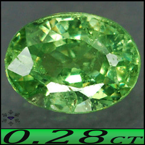 0.28 CT FIRE DASHING GREEN DRAGON DEMANTOID GARNET POLISHED IN A OVAL.