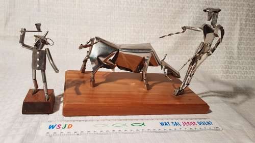 Two stunning metal art items (Wizard of Oz Tin Man and Matador and Bull)