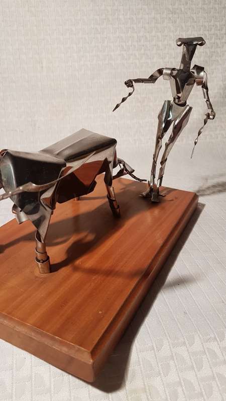 Two stunning metal art items (Wizard of Oz Tin Man and Matador and Bull)