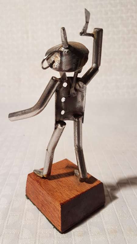 Two stunning metal art items (Wizard of Oz Tin Man and Matador and Bull)