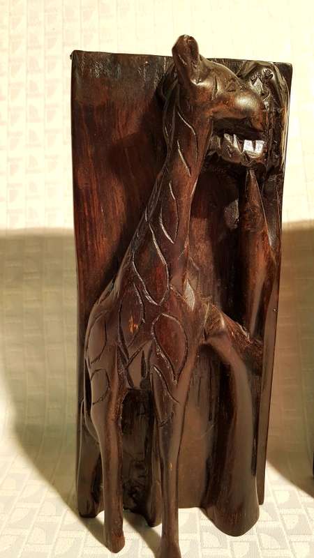 Two Giraffe book ends carved out of wood