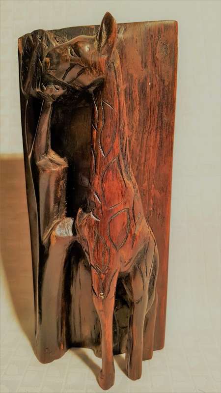 Two Giraffe book ends carved out of wood
