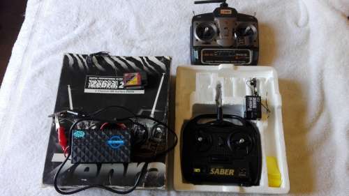 VARIOUS RADIO CONTROL RADIOS AND RECEIVERS ON AUCTION.
