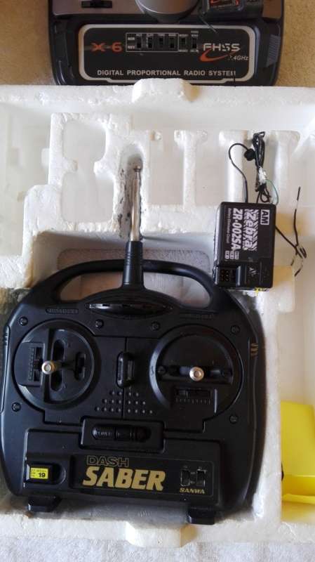VARIOUS RADIO CONTROL RADIOS AND RECEIVERS ON AUCTION.