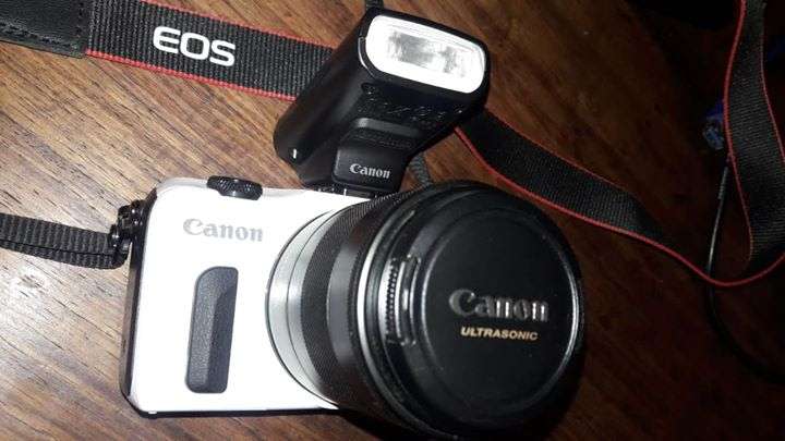 Canon EOS-M Mirrorless Digital Camera with many accessories