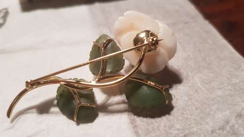 Gold flower brooch