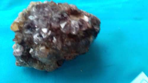 AMETHYST /CRYSTALS ON  ROCK BED     APPROX    300  GRAM