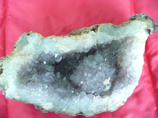 AMETHYST CRYSTAL IN A BED OF QUARTZ