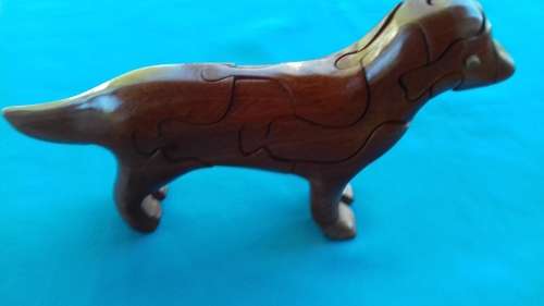 PUZZLED WOODEN DOG