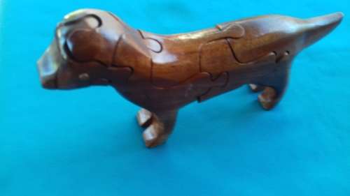 PUZZLED WOODEN DOG
