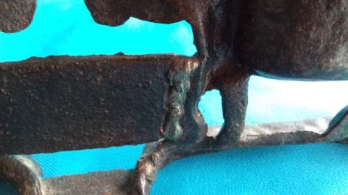 PAIR OF MULES    CAST IRON DOOR STOPPER